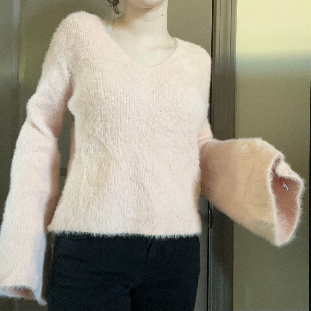 Fluffy pink v-neck sweater with flare sleeves